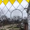 Custom design etched vinyl on glass window.