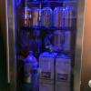 Custom pub logo installed on a beverage cooler door in etched vinyl. (Door closed)